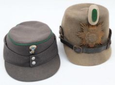 A 1914 Saxon Infantry cloth tschako: with cloth feldzeichen over helmet plate with cast cockades