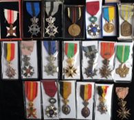 A group of Belgian orders and decorations: including King Leopold II Knight's Cross in case of