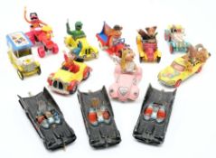 A group of Television related die cast vehicles: comprising three Corgi Batmobiles,