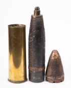 A WWI artillery shell in associated shell case,