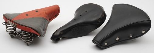 A Lycett's Imperial 99S black leather bicycle saddle: together with a Wright's Imperial saddle and
