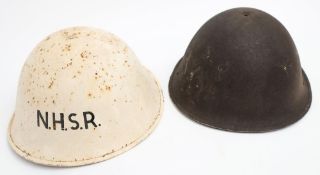 A post -war National Health Service Reserve MKIII steel helmet: white with black text,
