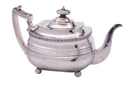 A George III silver teapot, maker IL, London, 1810: of barge-shaped outline,