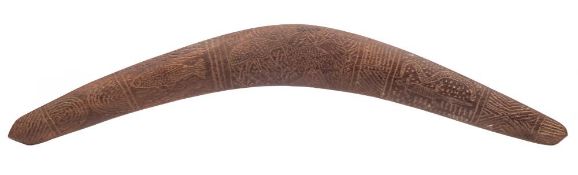 An Aboriginal boomerang: of traditional design , one side chip carved with lizard,
