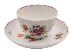 A Bristol [Richard Champion] fluted teabowl and saucer: painted with floral sprays and sprigs and