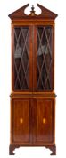 An Edwardian mahogany and inlaid upright display cabinet:, crossbanded in satinwood,