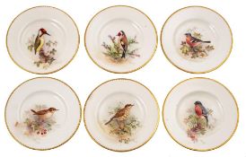 A set of six Royal Worcester small dishes painted by William Powell: with birds perched amongst