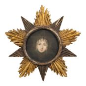 A carved and gilded wood 'Starburst' picture frame,:- aperture 14.