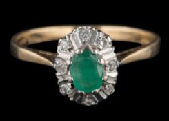 A 9 carat gold, green stone and diamond-set oval cluster ring: ring size N.