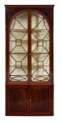 A 19th Century mahogany standing corner display cabinet:, in two sections,