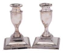 A pair of Edward VII silver desk candlesticks, maker Charles Boynton & Son, London,