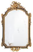 A 19th Century carved giltwood, gesso and ebonised mirror:, of cartouche-shaped outline,