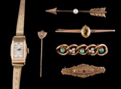 A 9 carat gold cased wristwatch on gilt metal bracelet: four bar brooches and a stick pin.