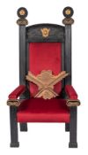 A late 19th Century ebonised and gilt decorated throne chair:,