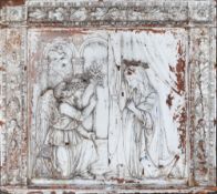 A terracotta plaque in the manner of Andrea Della Robbia: modelled in high relief with The
