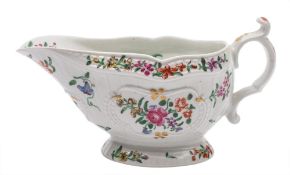 A First Period Worcester polychrome strap-fluted sauceboat: of large size,