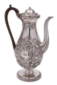 A George III silver coffee pot, maker Henry Chawner, London, 1789: crested,
