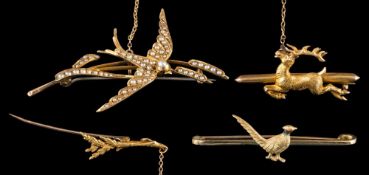 A pearl set swallow brooch: the swallow set with half pearls, stamped 15, 6.