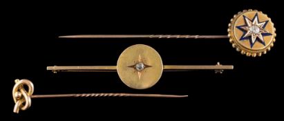 A diamond brooch: the circular panel set with an old cut diamond, on a bar brooch, 6.