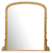 A Victorian giltwood and gesso domed overmantel mirror:, the plate within a moulded,