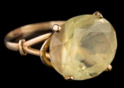 A 9 carat gold and oval quartz single-stone ring: in four claw setting, ring size Q.