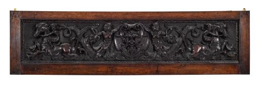 A 19th Century Italian carved walnut landscape panel:,