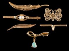 A group of brooches: including an opal set brooch; a butterfly brooch; and seven further brooches.