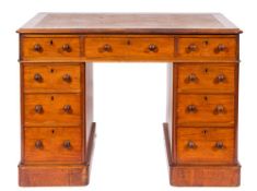 A Victorian mahogany pedestal desk:,