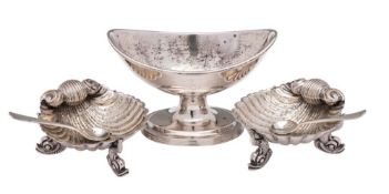 A pair of Victorian salts, maker George Unite, Birmingham, 1894: of shell-shaped outline,
