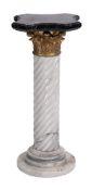 A grey variegated marble spirally reeded pedestal:,