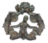 A late 16th/early 17th century bronze door knocker: in the form of grotesque sea monsters and