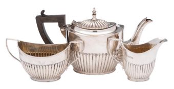 A matched three-piece batchelor's tea service,