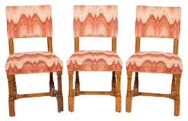 By Gillows A set of six Victorian Gothic oak 'Portcullis' chairs in the manner of A.W.N.