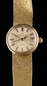 Eterna-Matic, Sahida, an 18 carat gold lady's wristwatch: the gold dial with black baton markers,