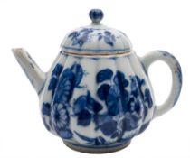A small Chinese blue and white teapot and cover: of chrysanthemum moulded form with bud finial,