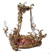 A brass and gilt metal four light chandelier:,