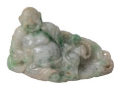 A Chinese jadeite carving of Hotei: of pale celadon and spinach flecked colour wearing loose robes