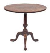 A George III mahogany circular tea table:,