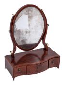A George III mahogany and inlaid oval swing frame platform toilet mirror:,