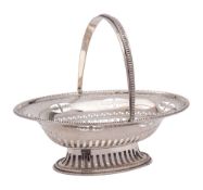A George V silver swing handled sweetmeat dish, maker S & Co possibly Sydney & Co, Birmingham,