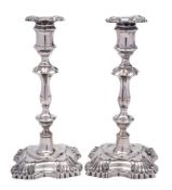A pair of Edward Vii silver candlesticks, maker William Hutton & Sons Ltd, London,
