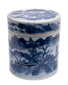 A Chinese cylindrical jar and cover: of cylindrical form painted in blue with an extensive lake