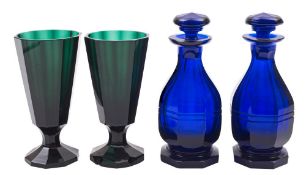 A pair of Bristol blue glass octagonal condiment bottles and stoppers,