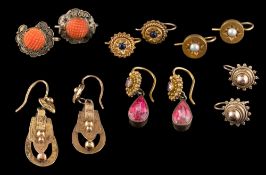 A pair of pink gem set drop-earrings: each with a gold and pink topaz fitting suspending a