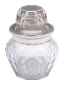 An early 20th century clear glass and silver mounted dressing table jar and cover: monogrammed.