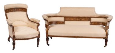 An Edwardian rosewood and marquetry salon settee of curved outline,
