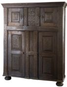 An early 18th Century Dutch oak livery cupboard:,