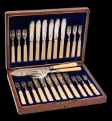 A set of twelve George V silver fish knives and twelve forks, maker Frederick C Asman & Co,