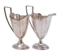 An Edward VII silver pedestal cream jug, maker William Aitken, Birmingham,