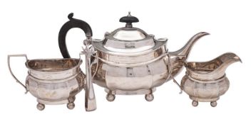 A George V silver three-piece tea service, maker Henry Williamson Ltd.